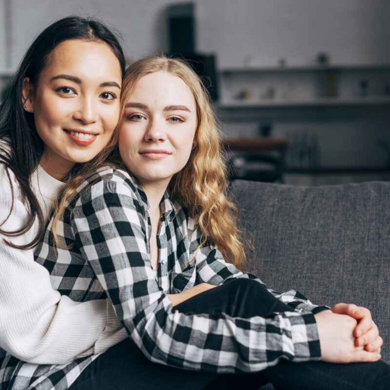 multiethnic-female-friends-hugging